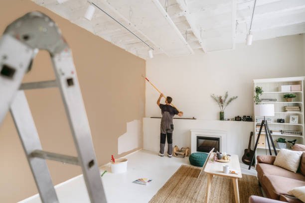Professional painter working on an interior wall